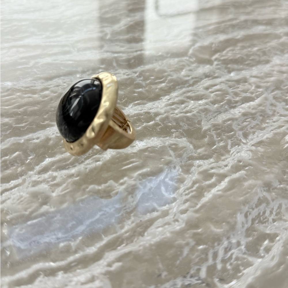 Elegant Black and Gold Ring